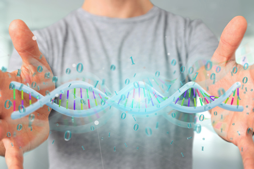 Mann som holder DNA med binærkode i hendene. Foto: Colourbox.