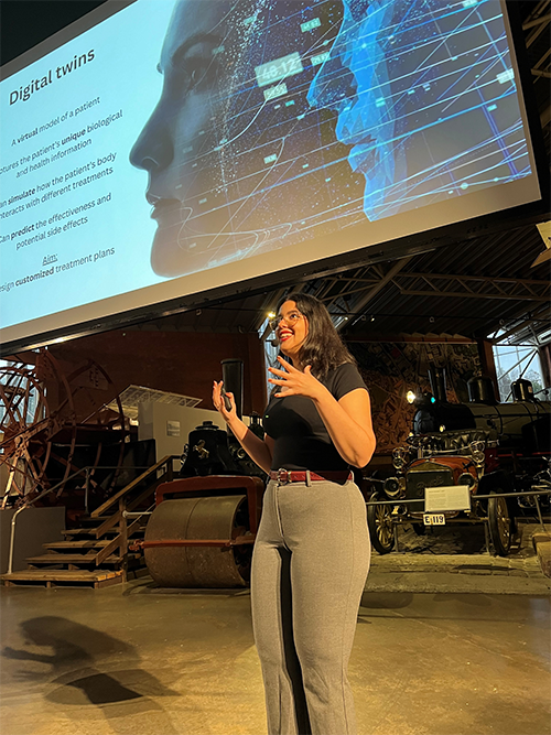 Eirini in front of her presentation