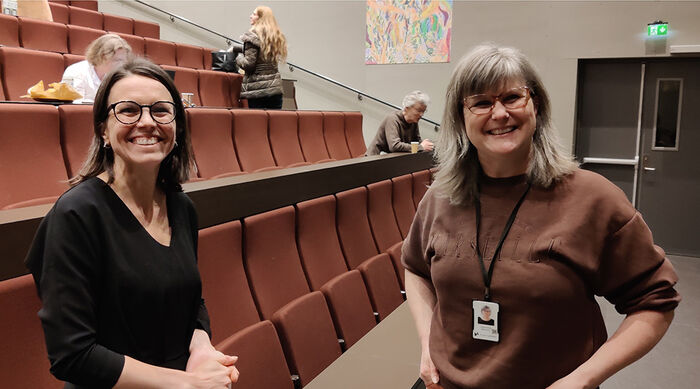 Olga and Cecilie smiling towards the camera before the event they spoke at.