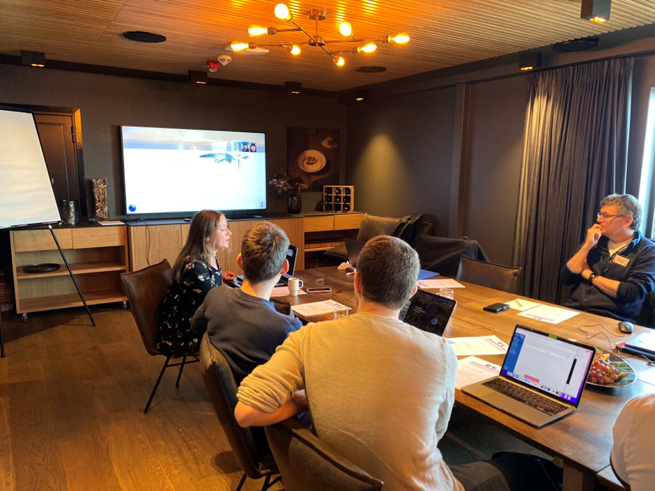 Researchers at a meeting table